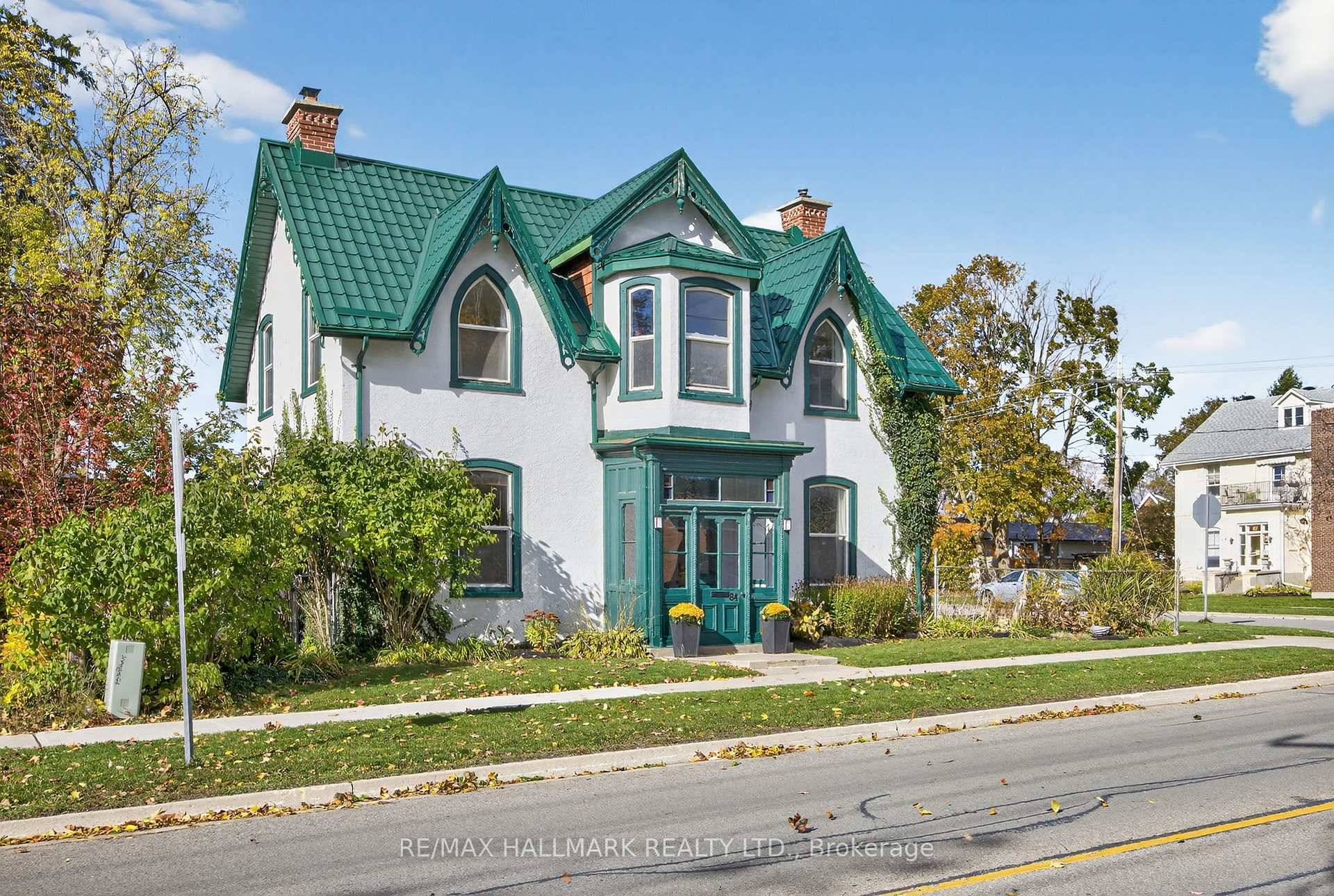 Experience timeless charm in this 4 bed, 2 bath architectural gem in Barrie's City Centre.