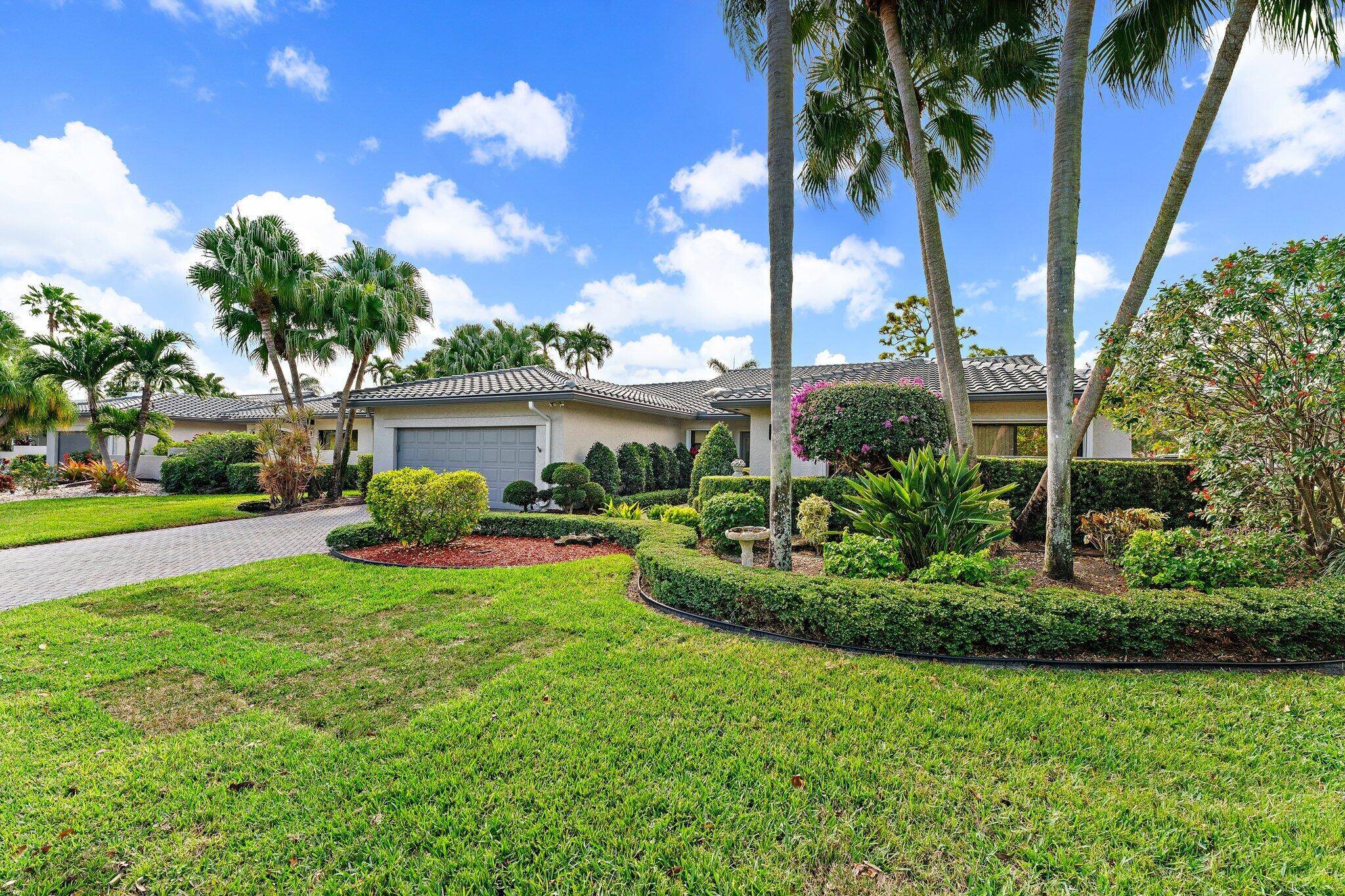 Enjoy golf and water views from this charming one story residence in Hunter's Run.