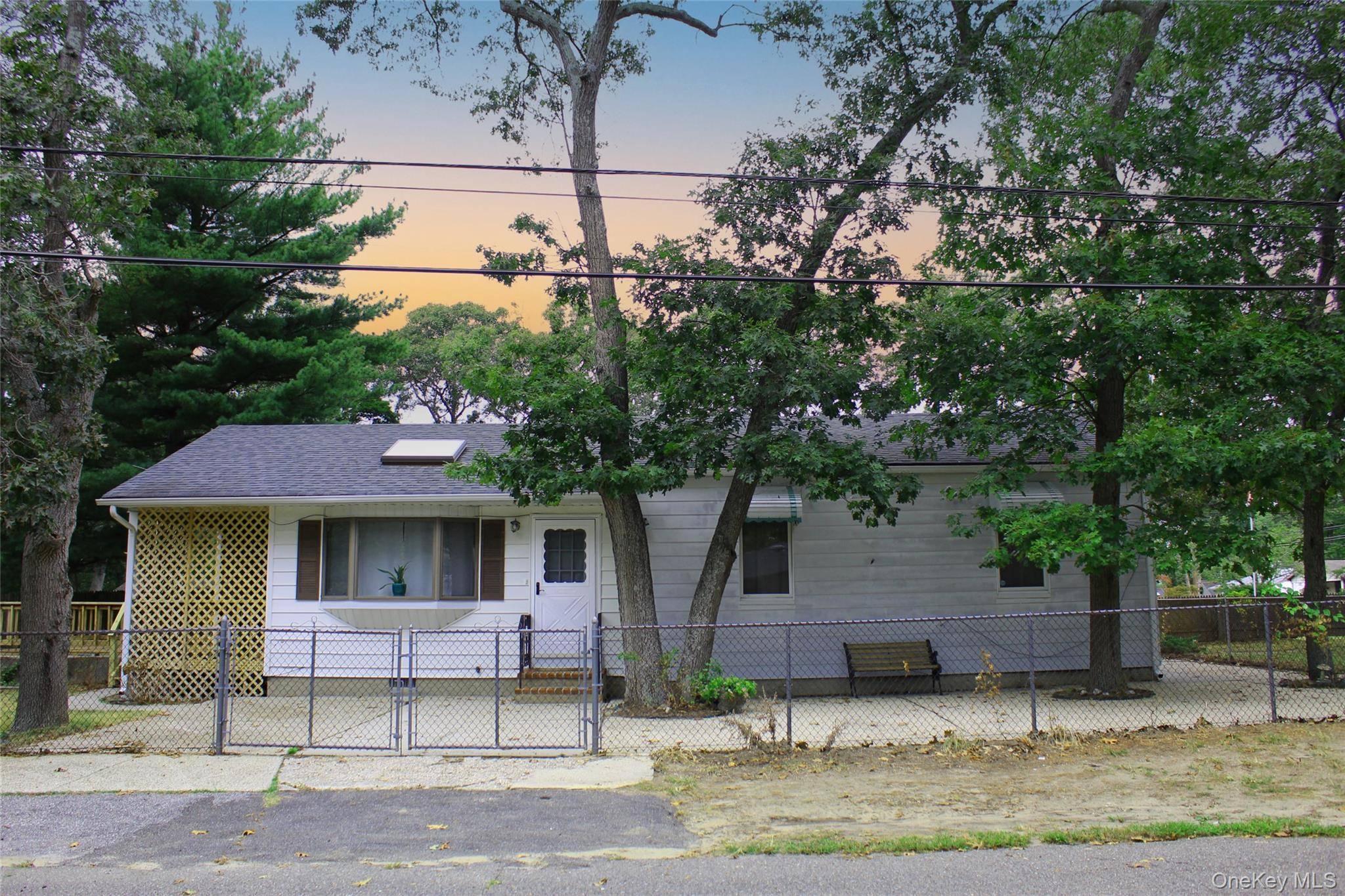 Welcome to this charming Ranch style home situated on a corner lot in Selden.