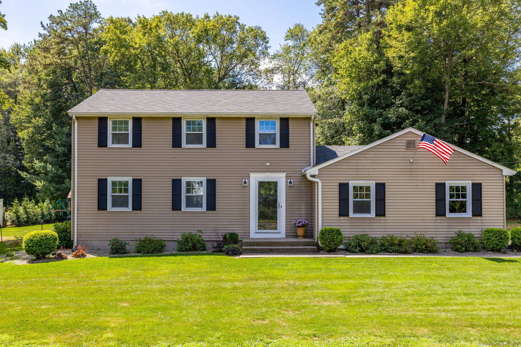 Beautifully maintained Colonial on a sunny corner lot with fenced backyard, and screened patio perfect for relaxing or entertaining.