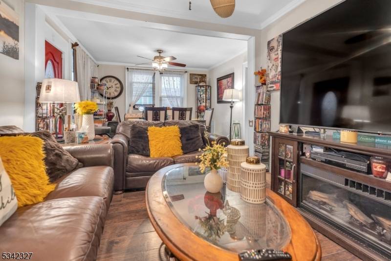 Welcome to this spacious home in Hillside NJ, perfect with extended living space, fantastic bonus area with a full finished basement, separate full bathroom and laundry room.