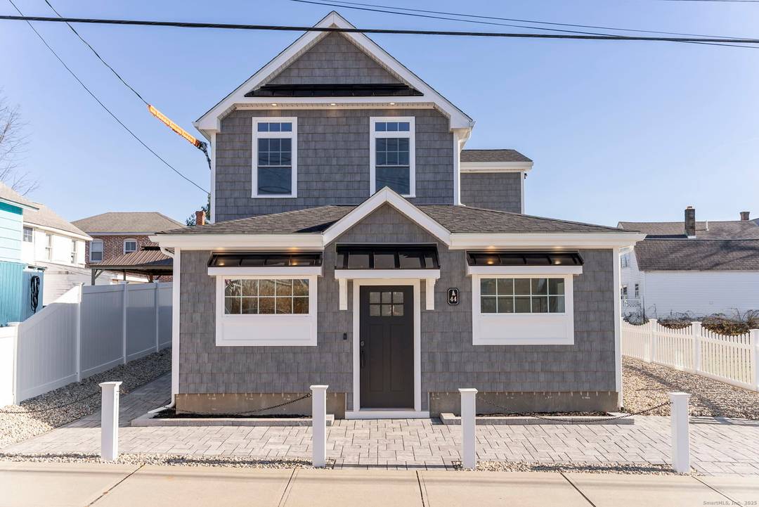 Just two blocks from the sandy shores of Sound View, this completely reimagined coastal home delivers the perfect blend of modern style and timeless beachside living.