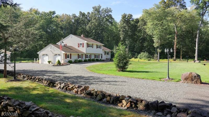 Welcome to this move in ready immaculate split level home which sits on a two acre park like setting.