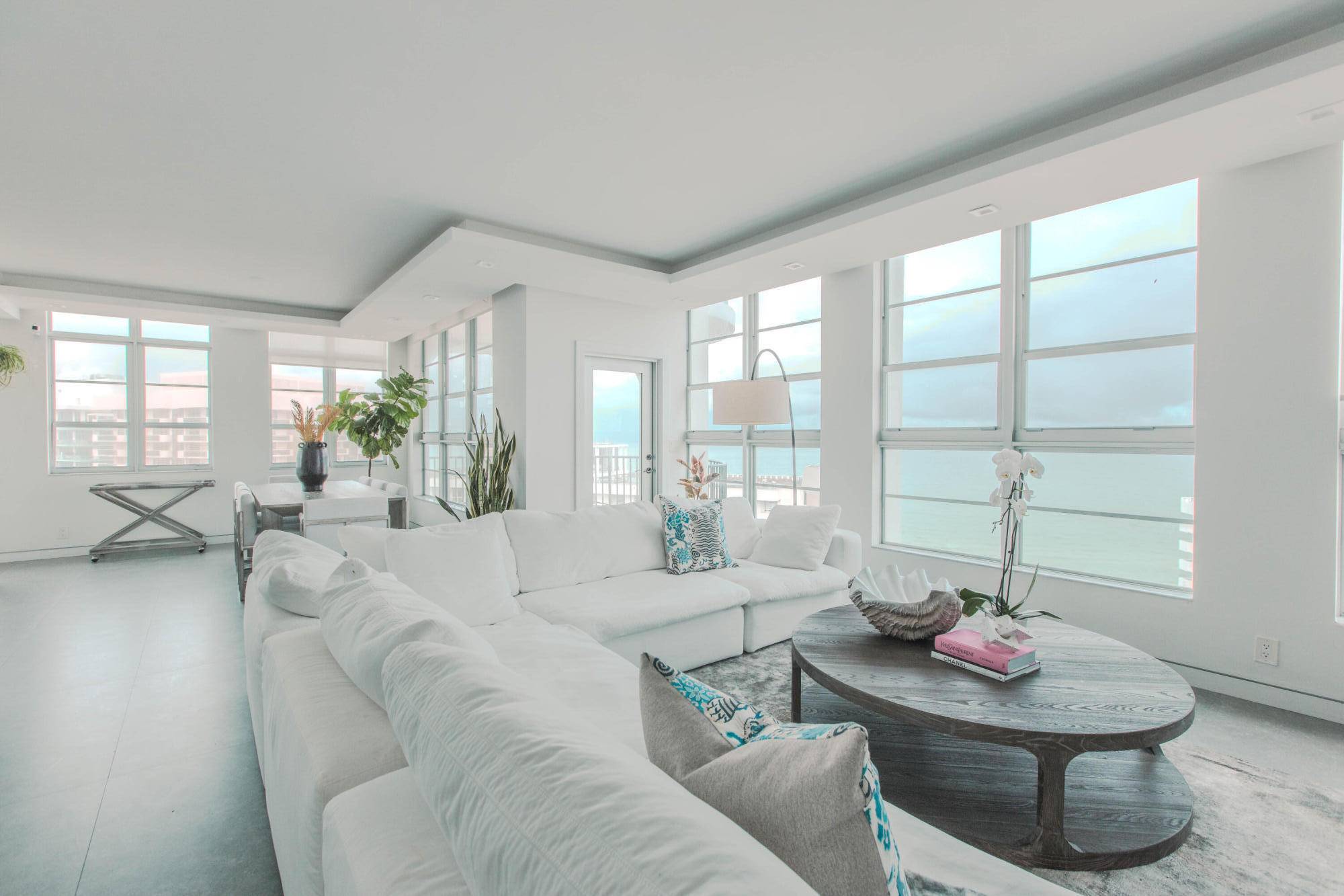 Welcome to your dream oceanfront lower penthouse condo, where modern luxury meets coastal living.