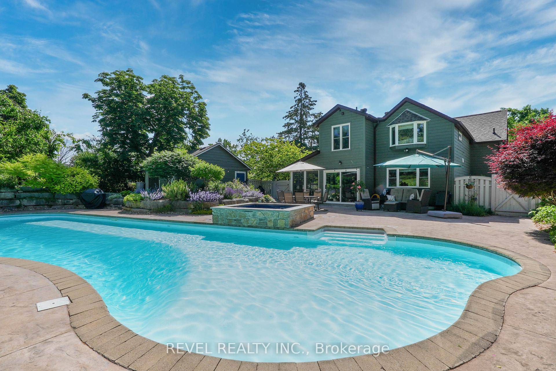 This rare, updated century home in the heart of Barrie offers the perfect blend of historic charm and modern luxury on a private 0.