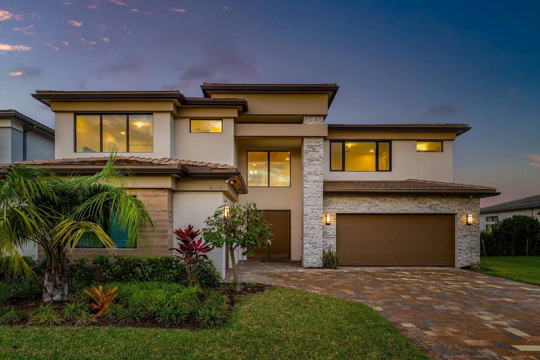 Rarely available Sumatra Grand cutting edge home built by GL Homes in Lotus Palm of Boca Raton.