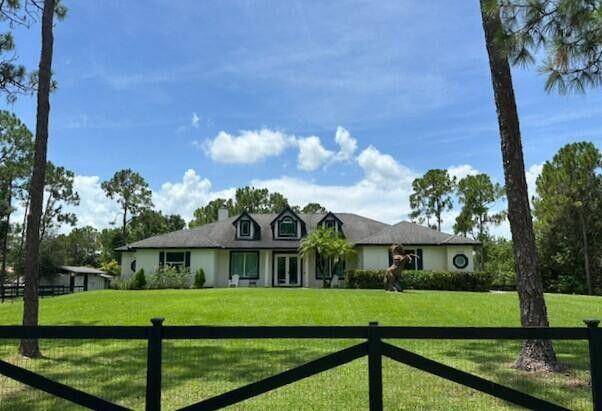 Equestrian Charm, Spacious Home with Vaulted Ceilings, Formal Living Room and Dining Room, Family Room Wood Burning Fireplace, Triple Sliders Open to Lanai, Spacious Kitchen Features Upgraded Cabinets, Stainless Steel ...