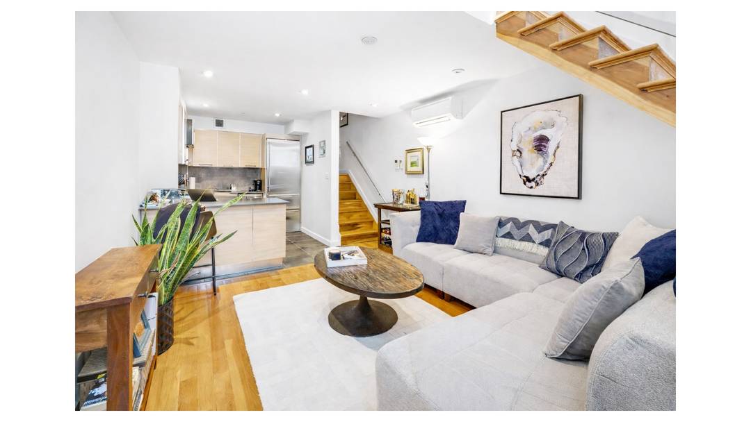 Modern Upper Eastside One Bedroom Condominium Duplex with Private Balcony.