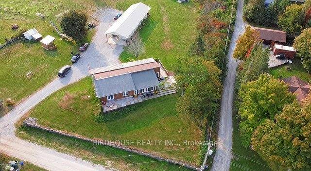 This 103 acre farmland with 1475 square feet raised bungalow has three bedrooms 2.