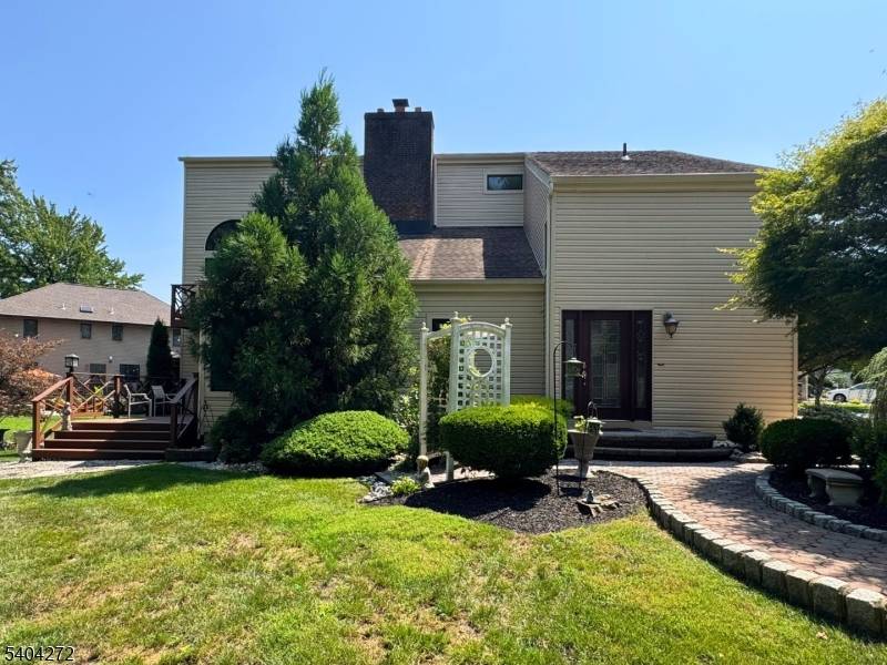507 Stalevicz Lane delivers a rare opportunity for vacation style living in the sought after Milton Lakes Community of Rahway.