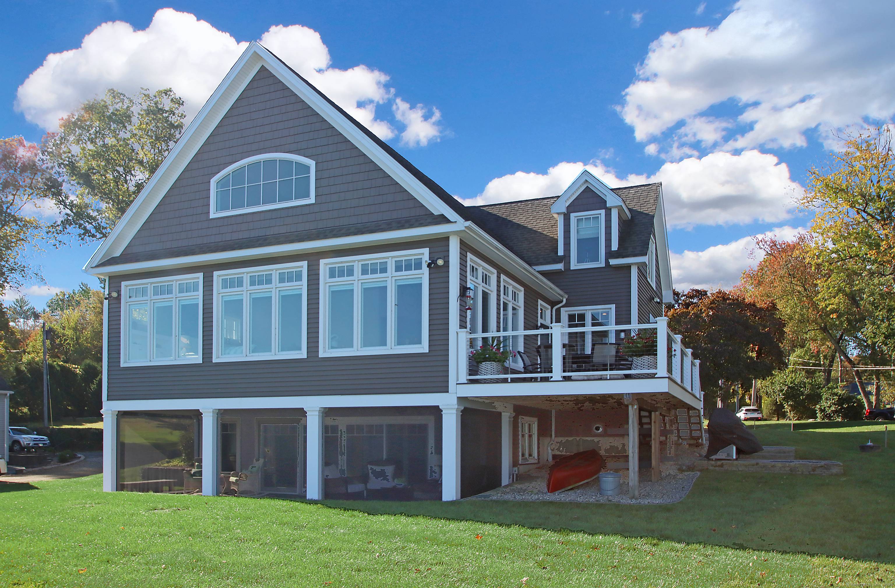 Welcome to this stunning custom crafted home, perfectly positioned on the direct waterfront of the highly sought after Columbia Lake.