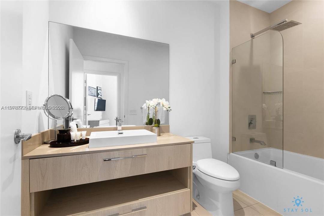 Fully furnished designer beachfront Condo unit with direct Ocean and beach views located at 5 star LYFE Resort amp ; Residences.