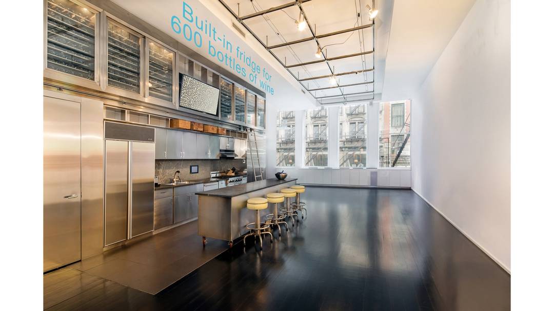 This magnificent loft, situated at 519 Broadway in SoHo, embodies urban elegance.