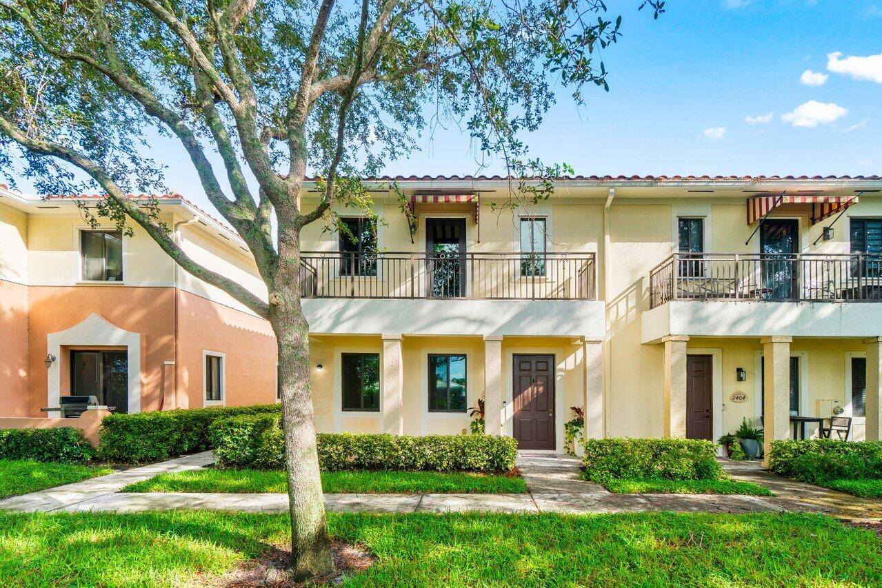 The only available townhouse with a private garden entrance and front yard overlooking the freshwater canal.
