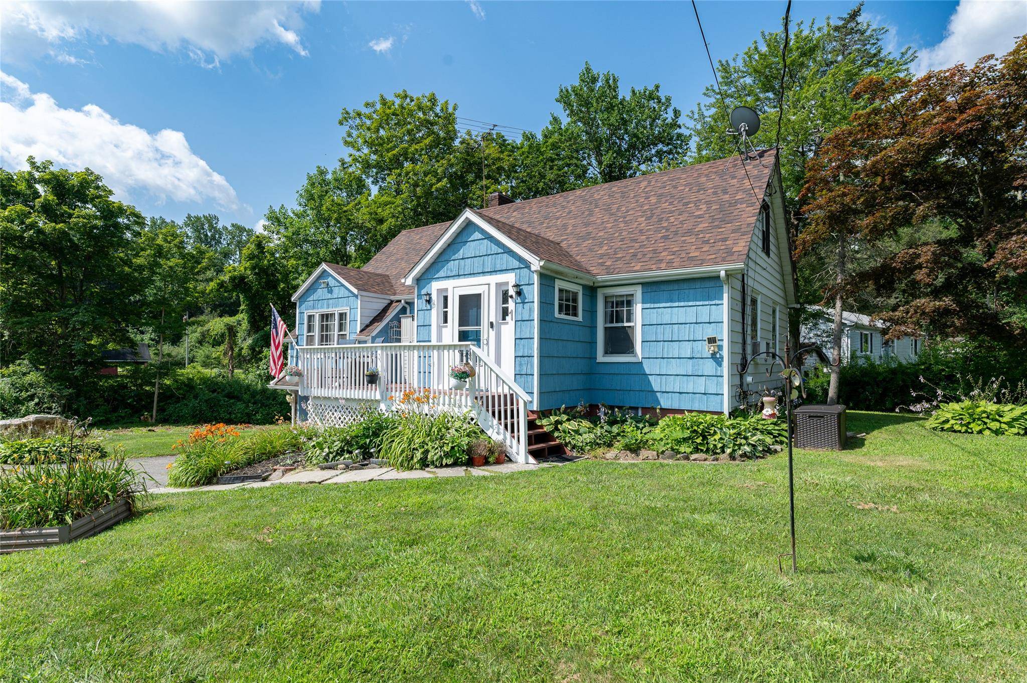 Tucked away on a peaceful cul de sac with lake views and private lake access, this 3 bedroom Cape offers classic charm, thoughtful updates, and an unbeatable Mahopac location.