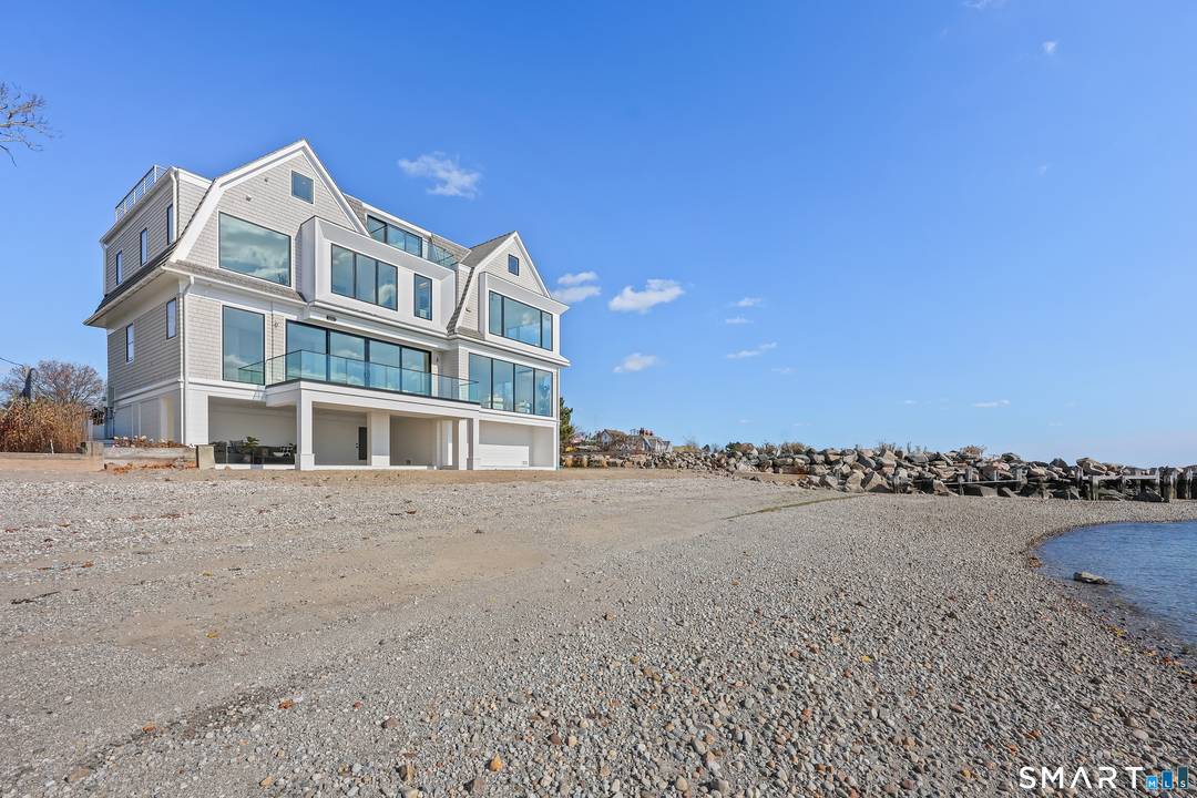 Rare opportunity to live directly on a private beach in Westport this summer.