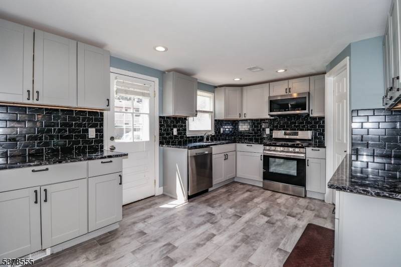 Exceptional 2 Bedroom, 2 Bath Jefferson Park end unit townhouse, fully updated and truly move in ready !