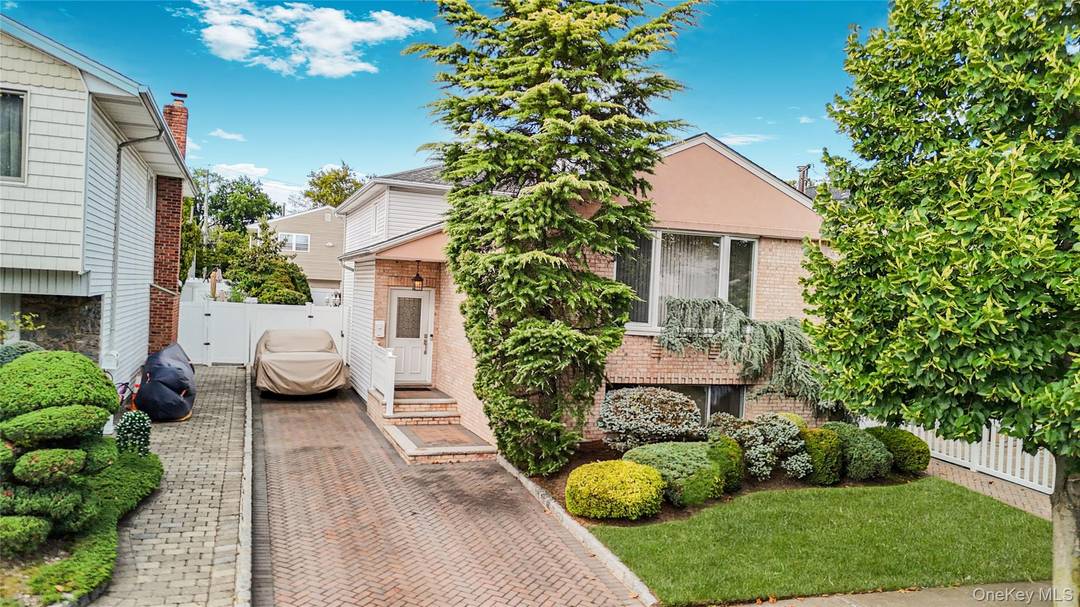 Step inside this unique two family split level and you'll instantly feel the difference.