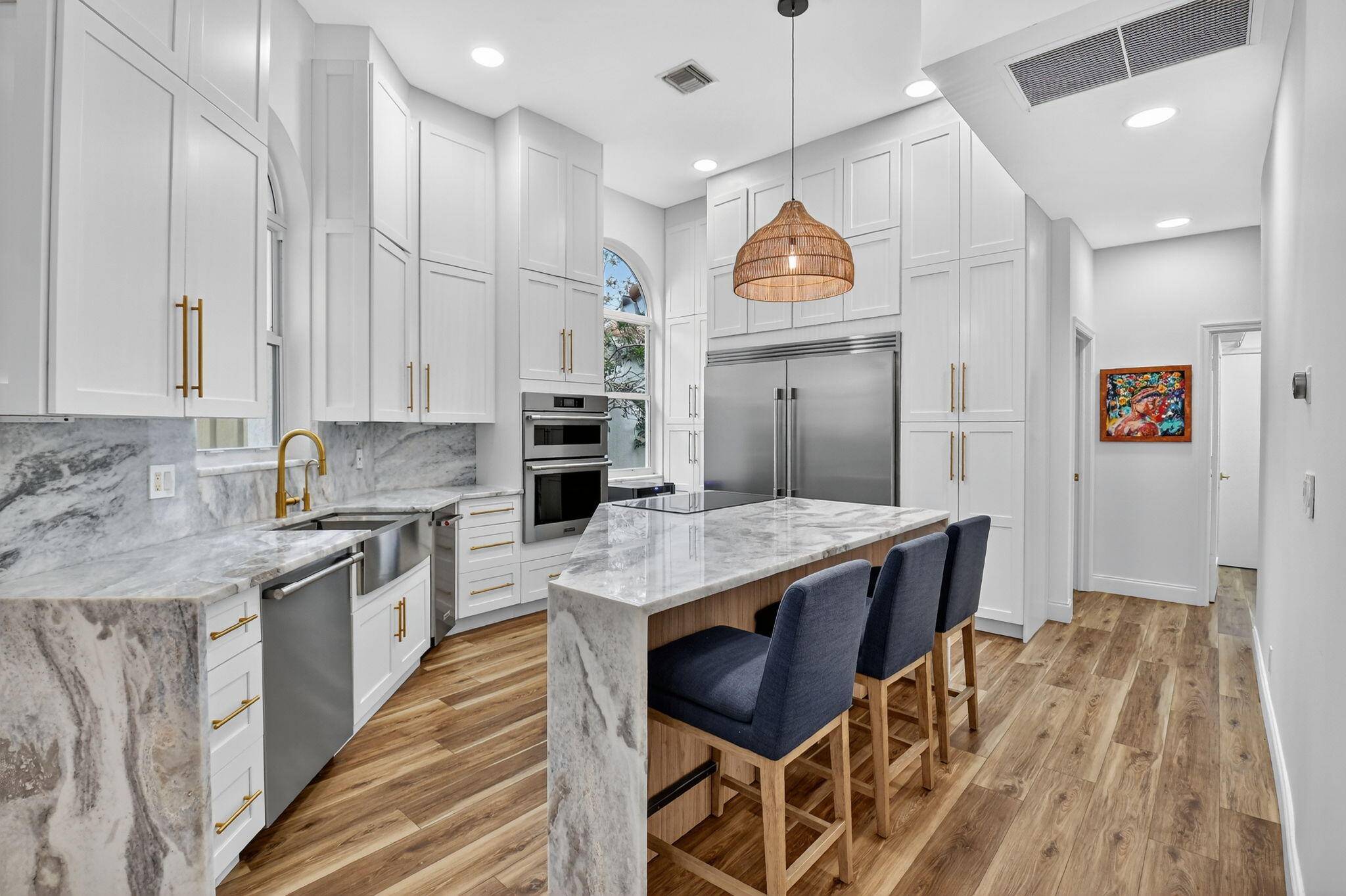 Welcome to your dream home in the prestigious Banyans Village of Broken Sound !