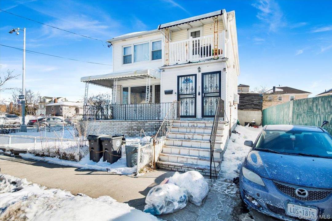 Two family duplex in Far Rockaway featuring 6 bedrooms and 3 baths.