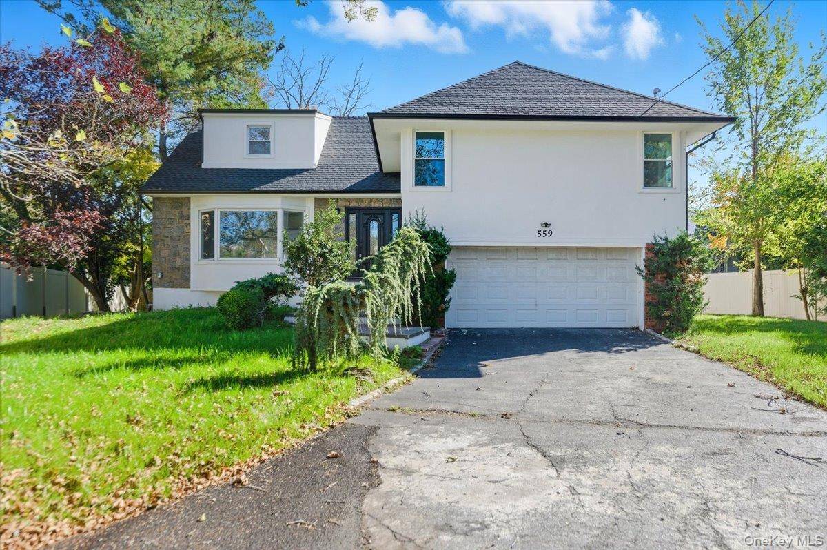 Exceptional and newly renovated home in Woodmere s most desirable area.