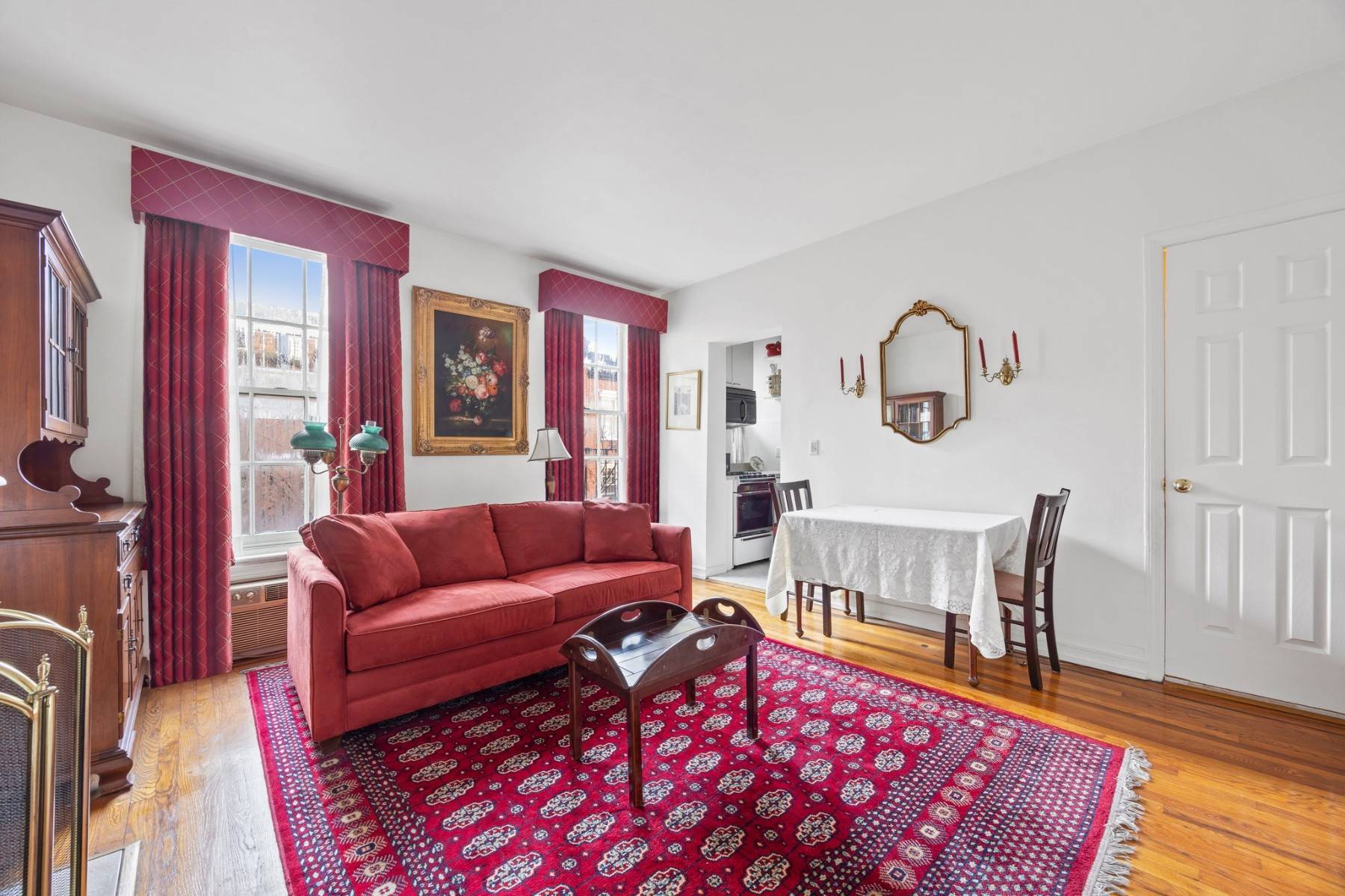 On a postcard perfect street in Manhattans most charming neighborhood, this sunny studio apartment with a working fireplace is now available in the West Village !