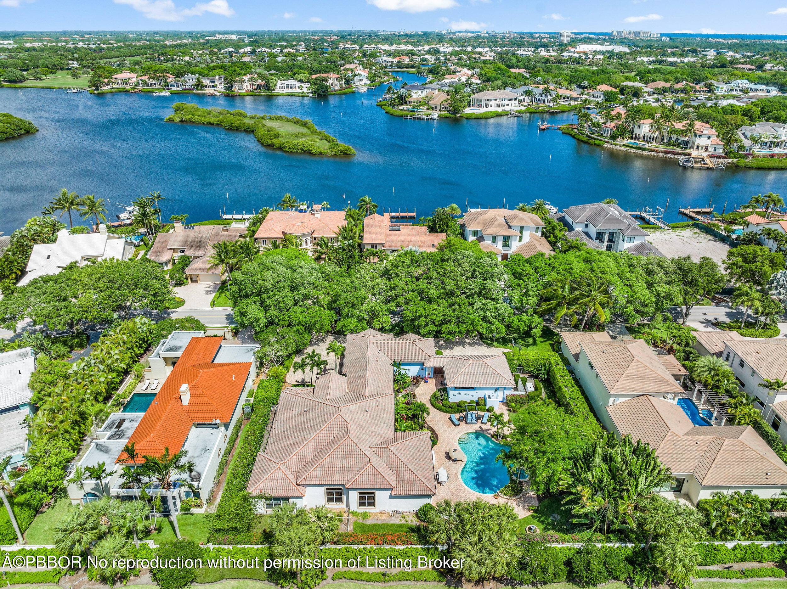 DOUBLE LOT Situated in the prestigious Admirals Cove, this property stands as a rare gem, encompassing one of the few double lots available.