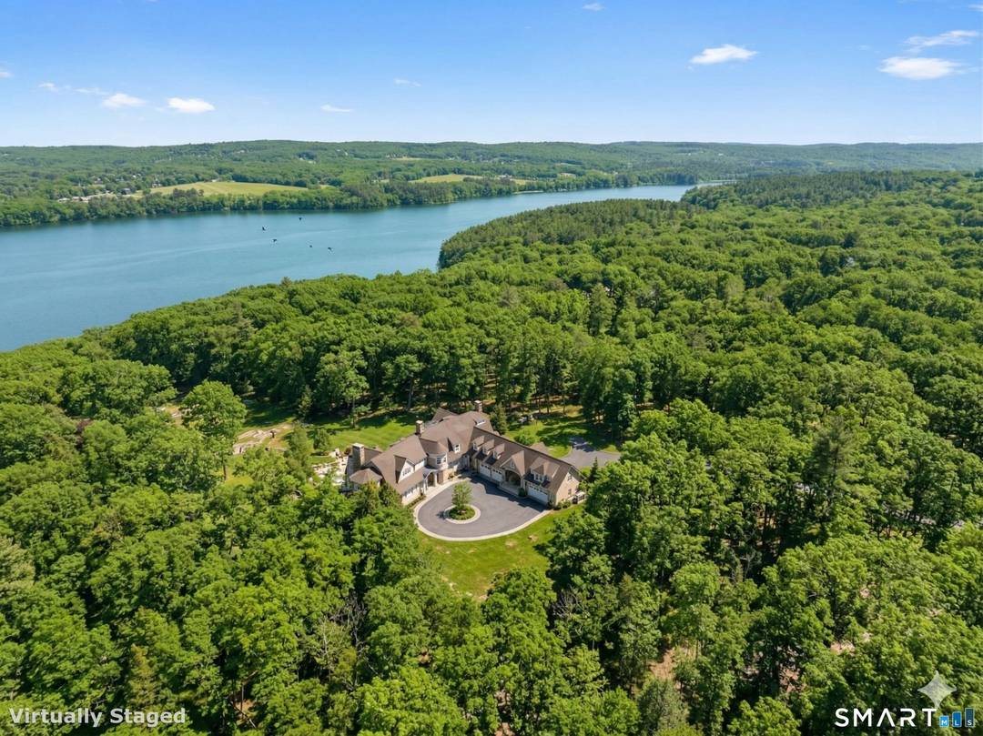 Welcome to Viewpoint an architectural masterpiece blending classic Nantucket shingle style elegance with unparalleled privacy on a bucolic 24 gated acres.