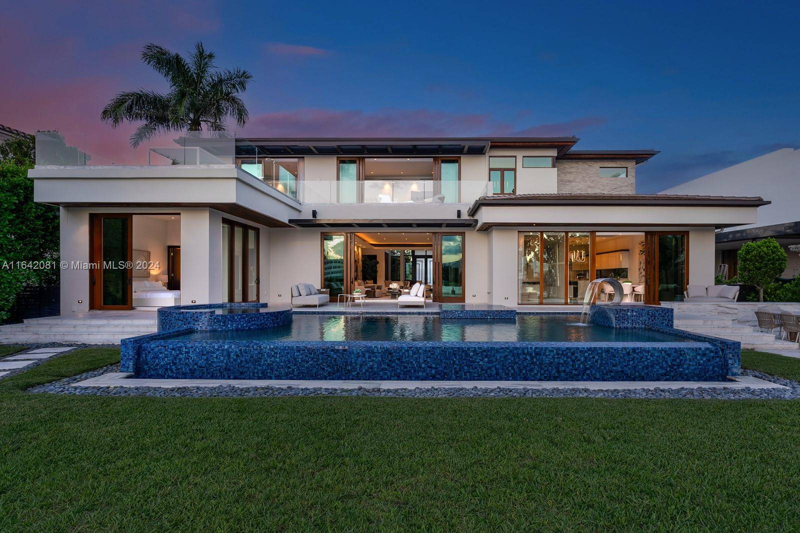 Step Inside with Me ! Nestled within guard gated Bal Harbour Village, 100 Bal Bay is 1 of only 36 waterfront addresses in this private enclave.