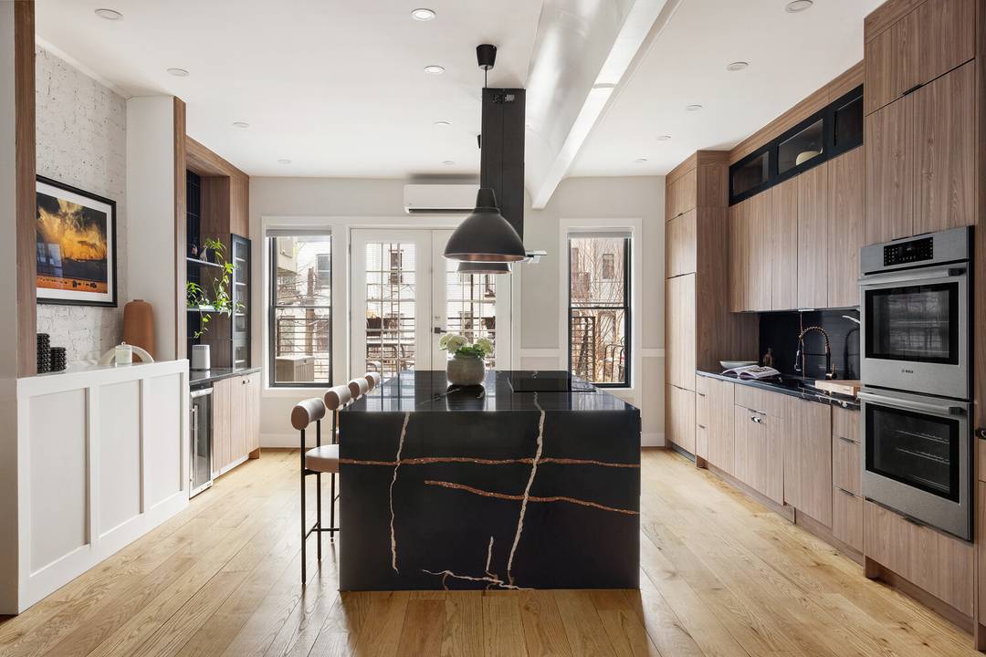 Welcome to this contemporary 19 x 50 ft Two family townhouse nestled in the heart of Bushwick.