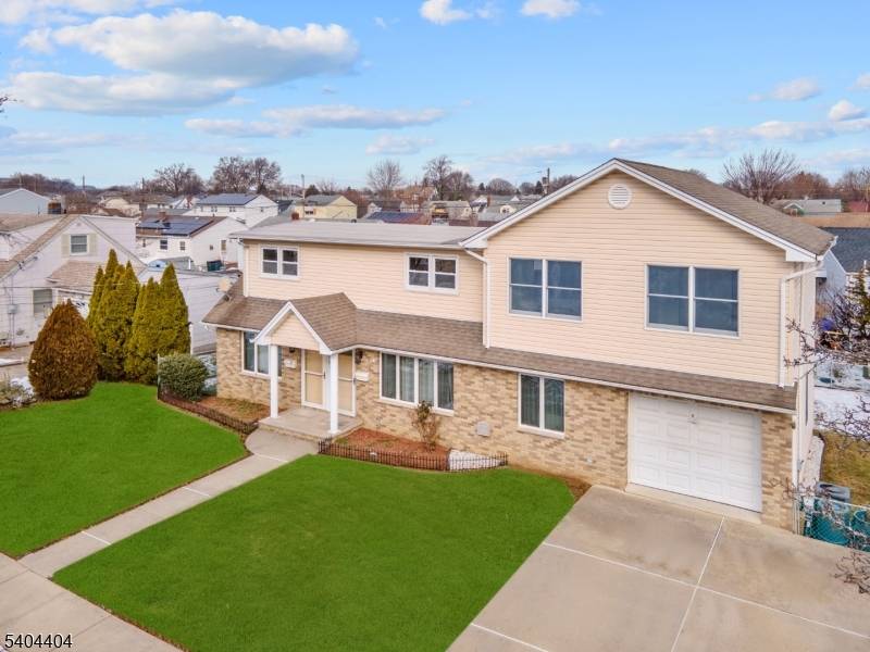 Welcome to this exceptional two family home in the highly desirable Athenia section of Clifton !