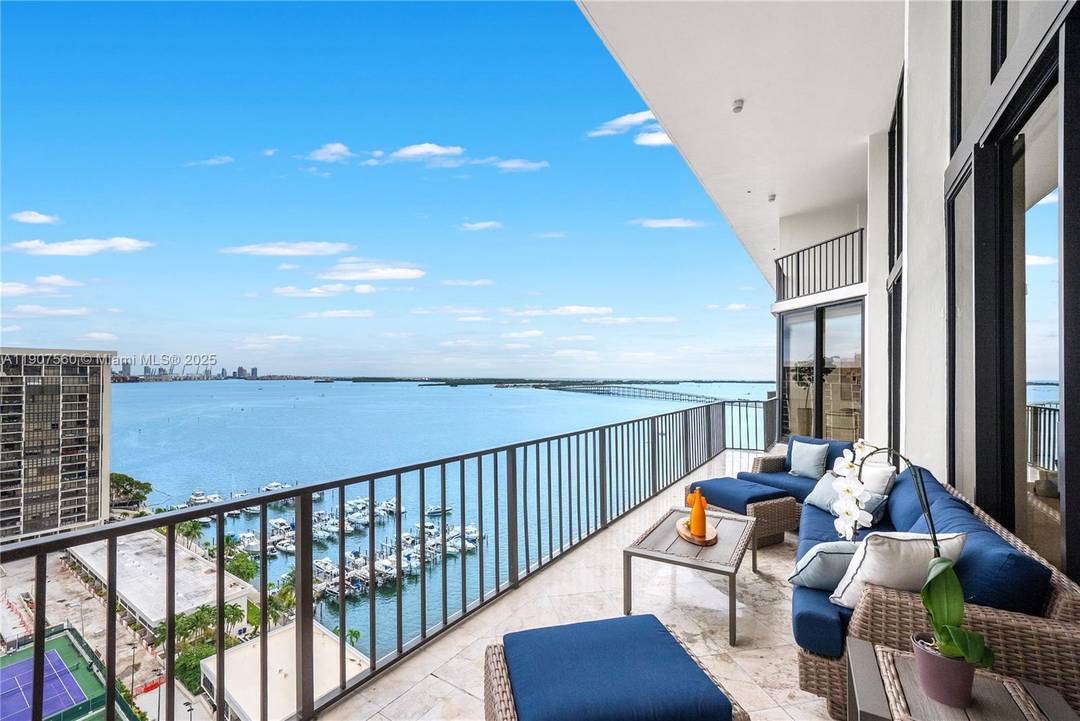 Penthouse Perfection ! Experience breathtaking panoramic water amp ; skyline views from this renovated 2 story residence in the heart of Brickell.