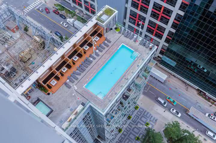 Step into the pulse of downtown living with this rare Tridel luxury corner suite in the heart of Torontos Waterfront Communities, Entertainment District, where every day feels like a city ...