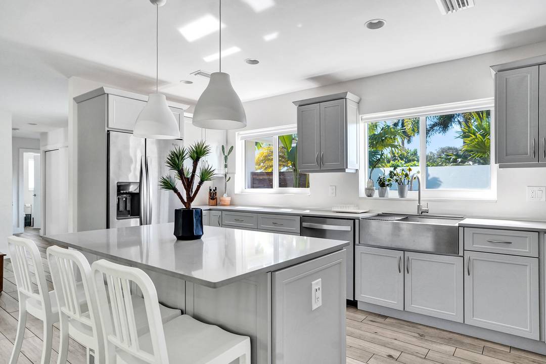 Welcome to Casa Flora turn key designer curated 2 2 home in East Boca's desirable Boca Square.