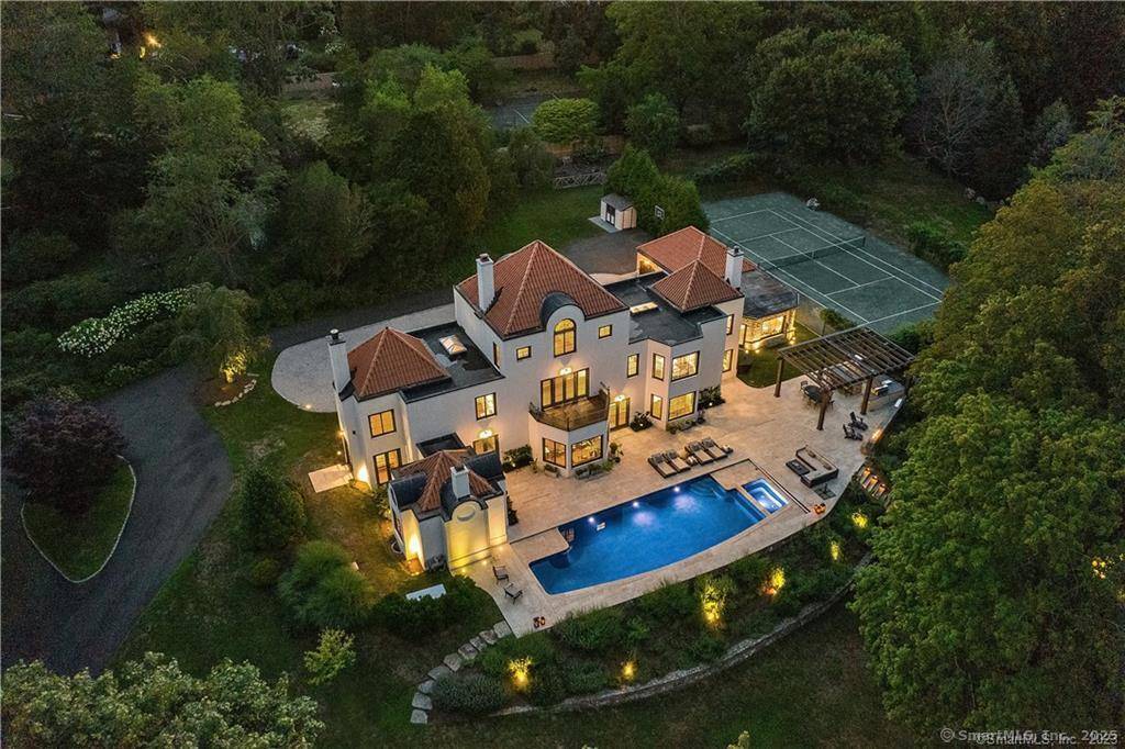 Nestled along Westport's prestigious 'Gold Coast, ' this architecturally magnificent estate on 4 acres of park like grounds with a breathtaking pool and professional grade Har Tru tennis court is ...