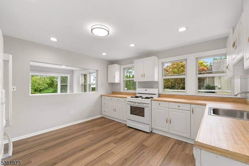 This beautiful four bedroom, two bath cape cod offers the perfect blend of comfort and convenience.