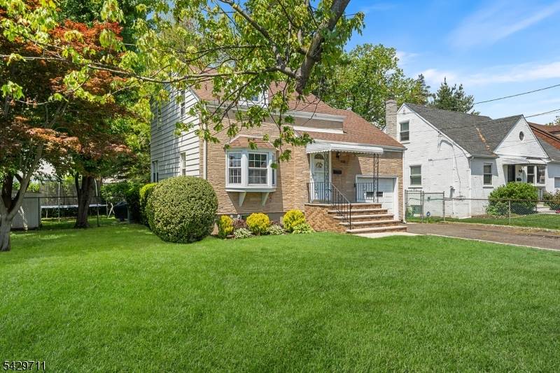 Sun filled Colonial home that truly shines with thoughtful updates and timeless charm.