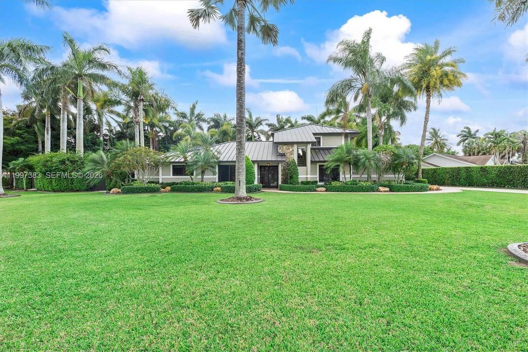 Experience a rare combination of luxury and utility on this sprawling half acre corner lot in Kings Grove.