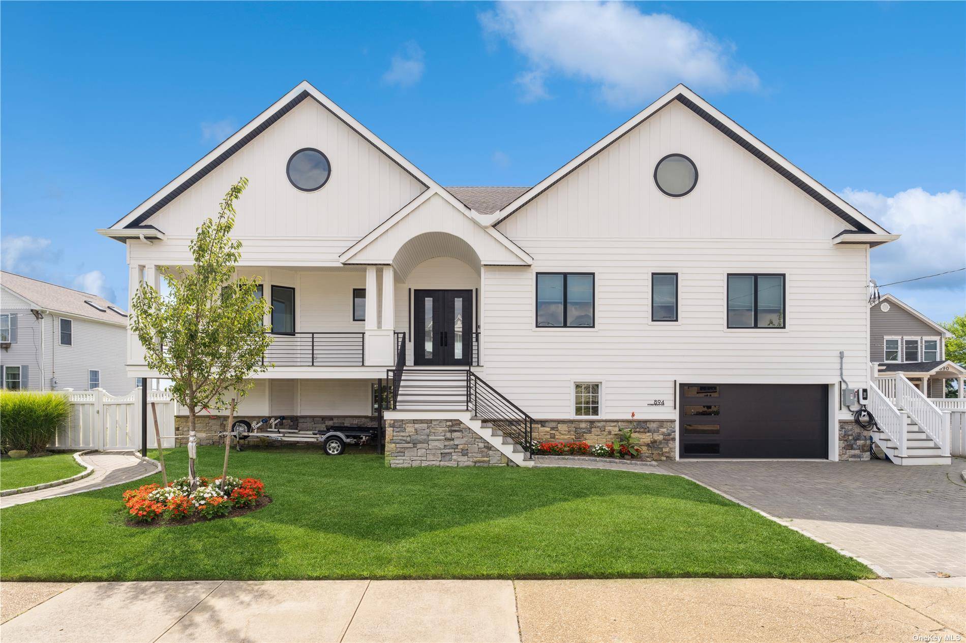 This Modern Luxury Home is a Three Level Masterpiece Nestled Along the Bay.