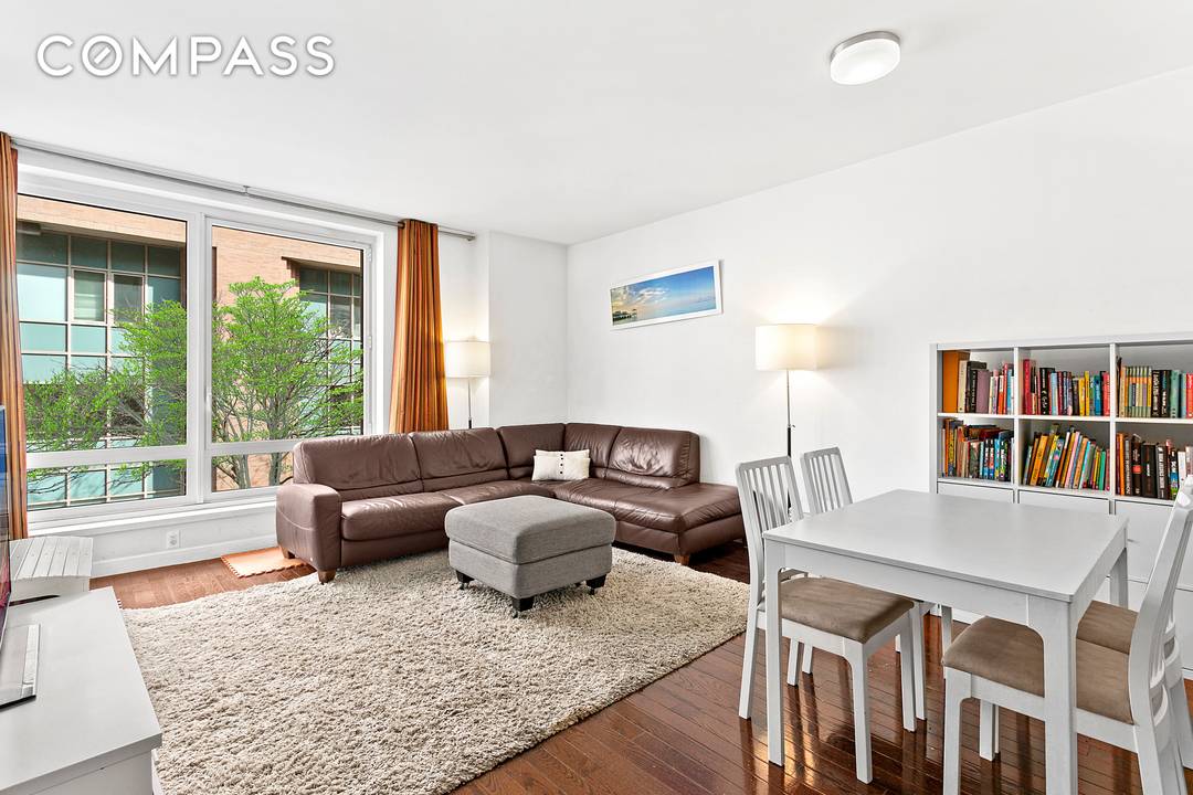 Residence 3E at Hudson Hill Condominium is a rare and expansive 995 square foot one bedroom home that lives far beyond its footprint, offering two full bathrooms and a versatile ...