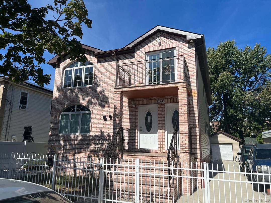 Huge two family custom built 6 bedrooms, 5 bathrooms, full finished basement.