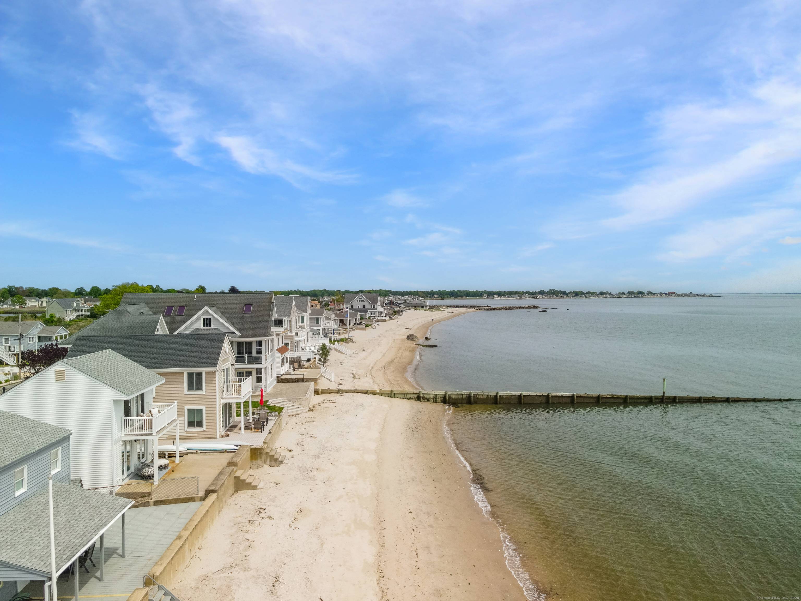 Welcome to 16 Beach Rd E Your Dream Beachfront Escape in Chalker Beach Association.