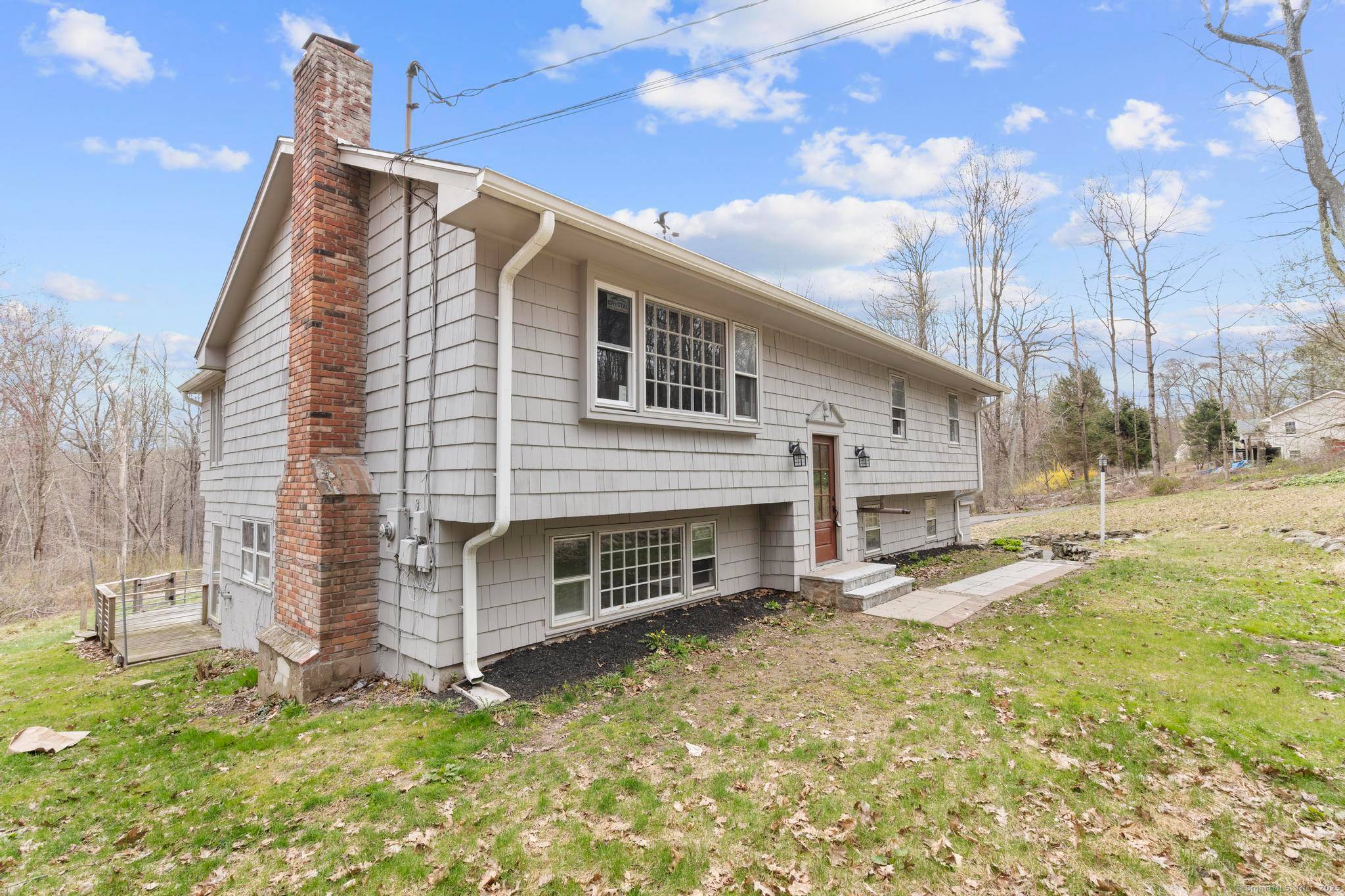 Nestled on a picturesque 2 acre lot in Sandy Hook, this beautifully updated 4 bedroom, 2 bath raised ranch combines modern style, privacy, and versatile living space.