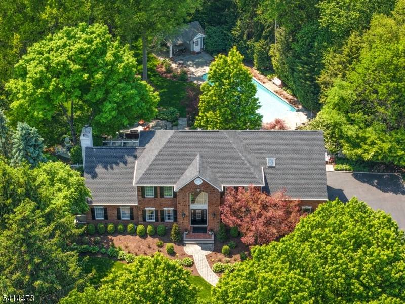 Set on a quiet Basking Ridge cul de sac, this exceptional 5 bedroom, 3.