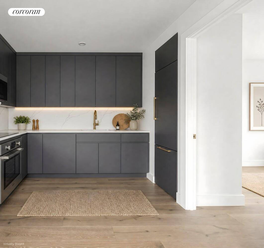 Welcome to unit 2R at 749 Park Place, a thoughtfully designed two bedroom, one bath residence offering 601 square feet of efficient, light filled living.