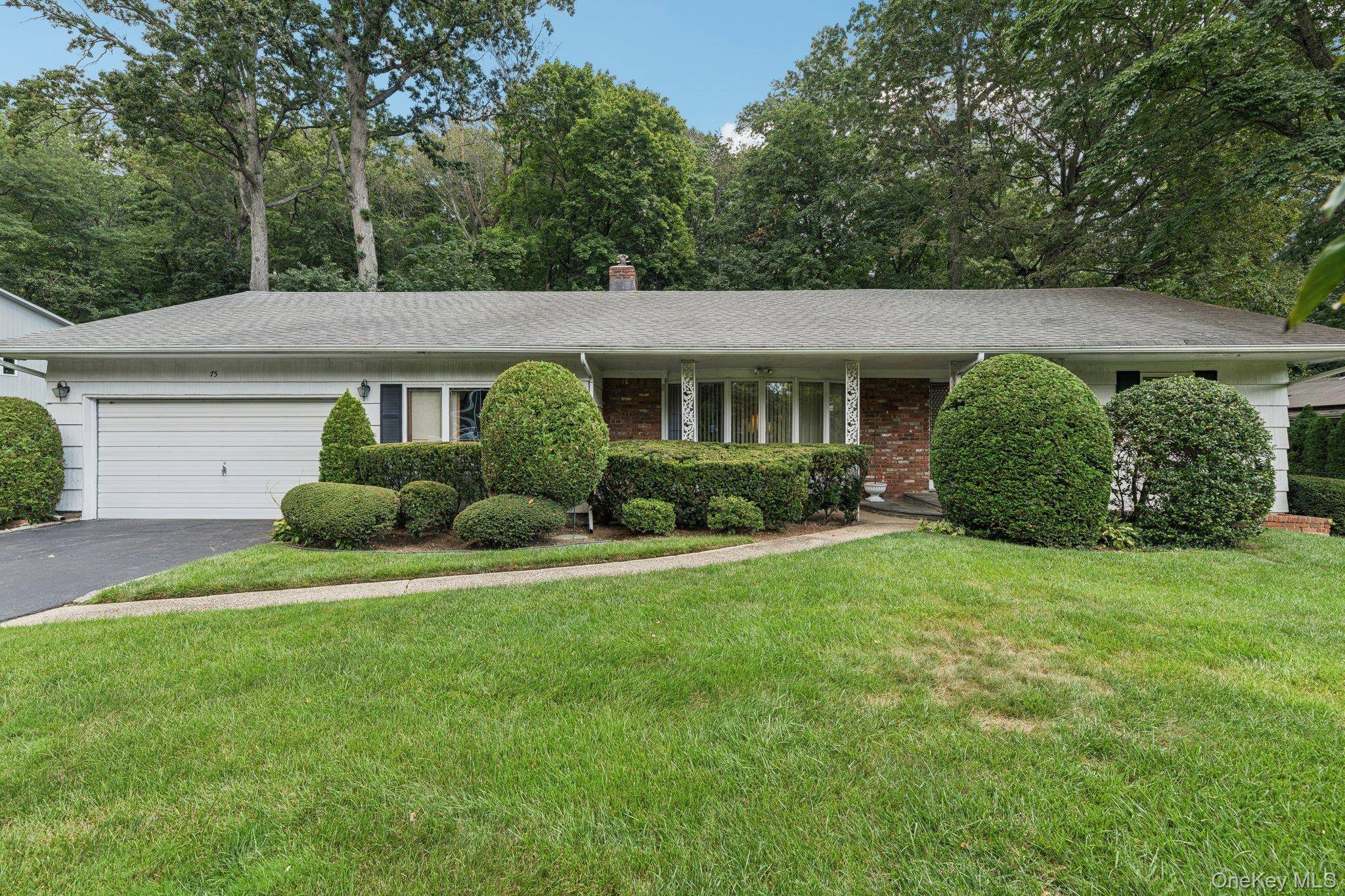 Located in the highly sought after Country Estates at East Hills, this expanded ranch offers an exceptional opportunity to craft the home of your dreams.