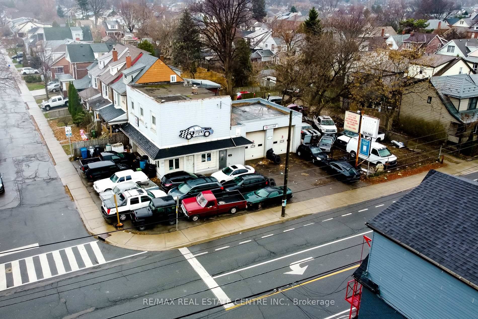 Freestanding Auto Body Shop with Residential Unit Prime Hamilton Location !