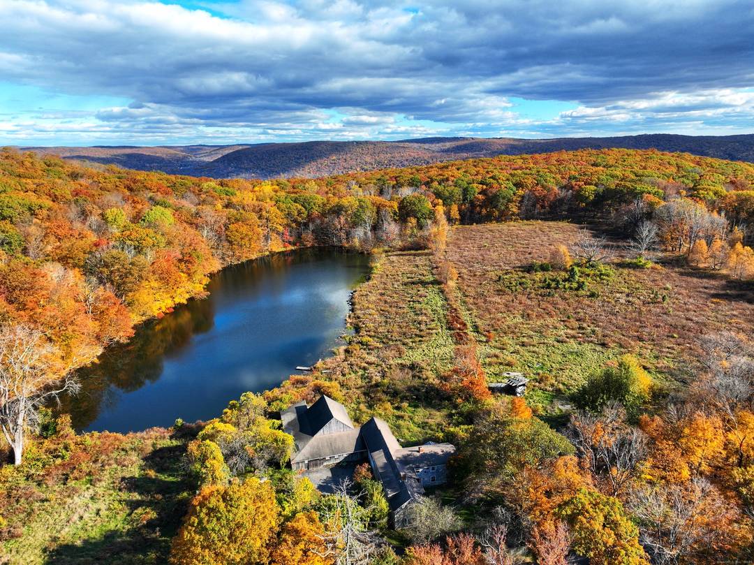 A remarkable 139 acre property located up on Skiff Mountain surrounded by 7, 000 acres of protected lands.