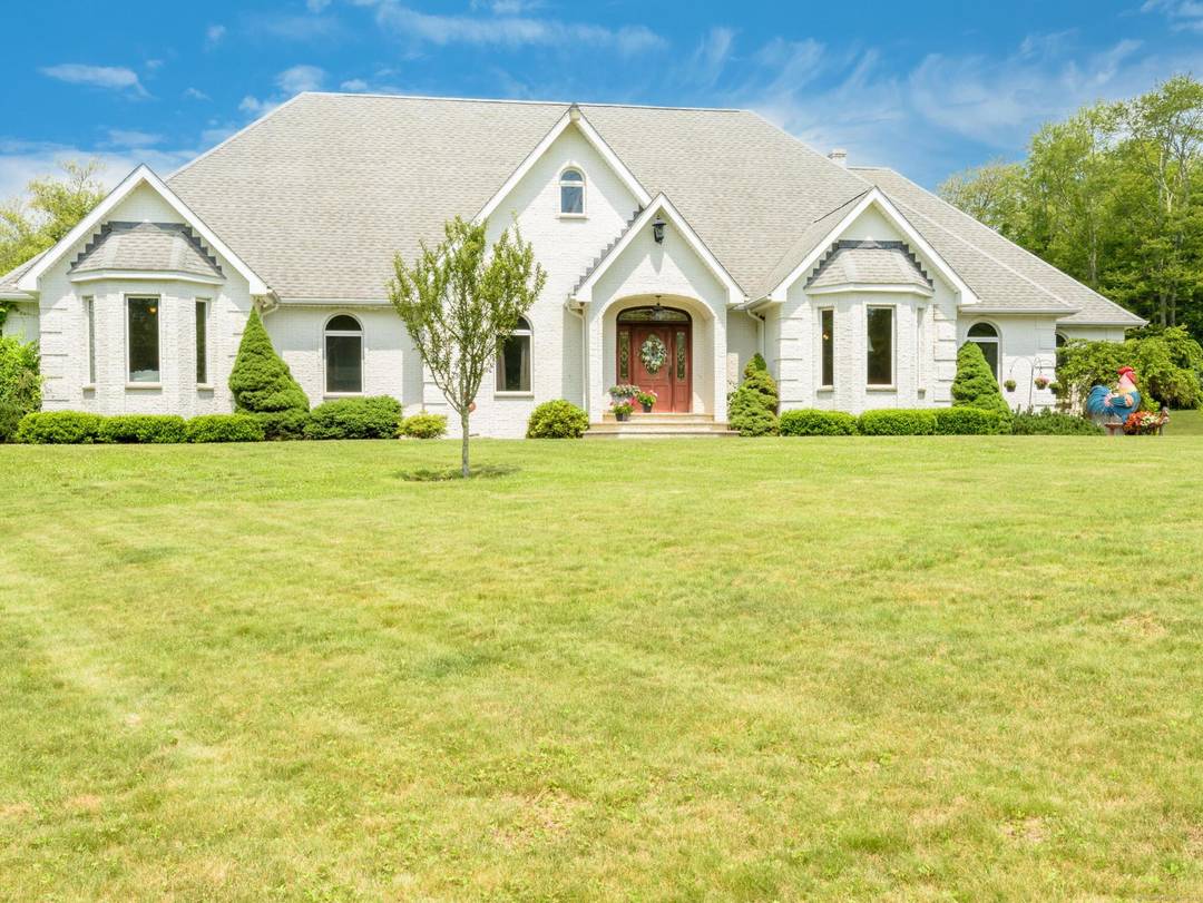 A one of a kind stunning Contemporary Ranch custom built by the current owners !