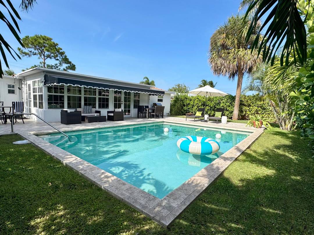 The Definition of Palm Beach Luxury This coastal oasis has been completely renovated all in the heart of the highly desirable 'SoSo' neighborhood.